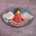 Witacz anioł - Dom Pod Szczęśliwym Aniołem