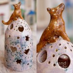 Świecznik ceramiczny z wilkiem