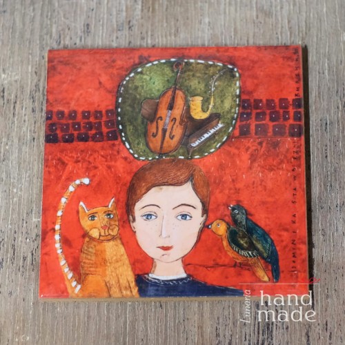 Kafelek ceramiczny z obrazkiem marzyciela.